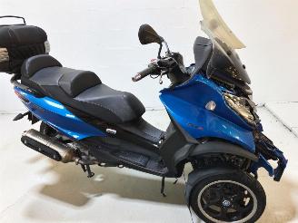skadebil bedrijf Piaggio Navara MP3 2014/8