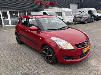 damaged passenger cars Suzuki Swift 1.2  5-drs Comfort airco 2013/3