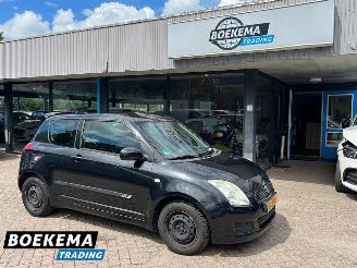damaged passenger cars Suzuki Swift 1.3 Base Airco Elektrische ramen 3-Deurs 2009/10