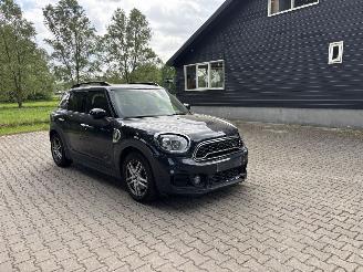 Coche accidentado Mini Countryman COOPER SPORT HYBRIDE PLUG IN SE 4AWD AUTOMAAT NAVI CLIMA LEER LED PDC STOELVERW B.J 12-2019 2019/12