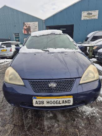 Salvage car Suzuki Liana (ERC/ERD/RH4) Hatchback 5-drs 1.6 MPi 16V (M16A) [76kW] 2004/1